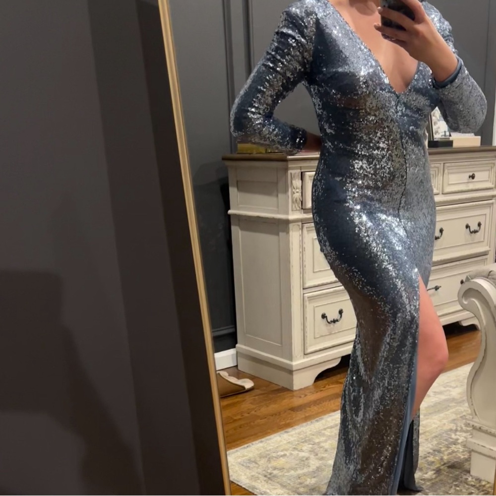 Floor length blue/silver long sleeved sequins gown with front slit